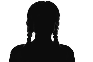 silhouette of a girl with pigtails