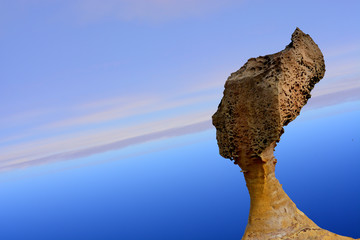 Queen Rock in Yehliu Geopark, Taiwan on Northern light or Aurora Borealis background