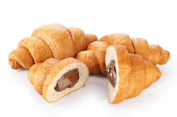 Sliced croissant with chocolate isolated on white background