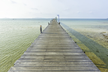 Wooden bridge to the sea