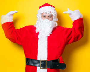 Fototapeta na wymiar Funny Santa Claus have a joy