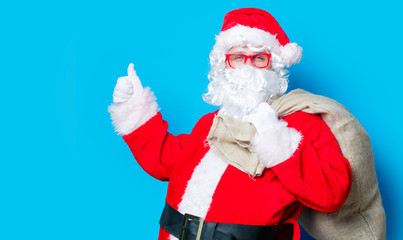 Funny Santa Claus have a fun with red eyeglasses