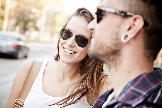 Portrait of young couple with sunglasses