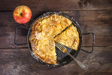 Apple puff pancake pie with apple and copyspace