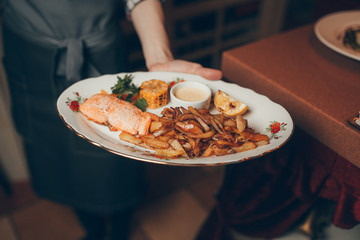 dishes in hand