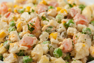 Traditional salad with cooked vegetables with mayonnaise.
