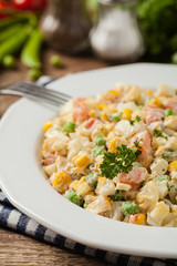 Traditional salad with cooked vegetables with mayonnaise.