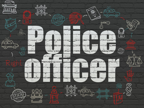 Law concept: Police Officer on wall background