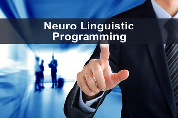 Businessman hand touching  Neuro Linguistic Programming (or NLP) message virtual screen
