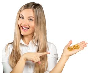 woman holding a Golden Bitcoin. virtual money.