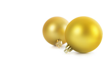 Two beautiful christmas gold balls isolated on white