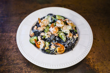 Spaghetti with seppia and shrimp - Italian food. 