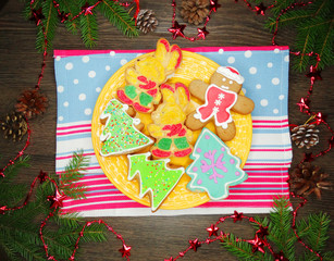 christmas cookies gingerbread and decoration on wooden background