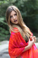 Naklejka premium Outdoors portrait of attractive blonde girl