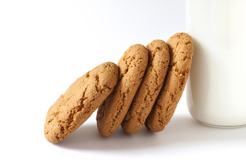 Some homemade cookies and bottle fresh milk