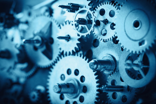 Vintage gears and cogs macro blue color toned