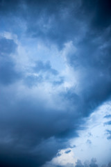 Beautiful clouds at sunset after rain as background .