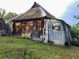 Old disturbed wooden house. Bulatovo village, Kaluzhskaya region, Russia.
