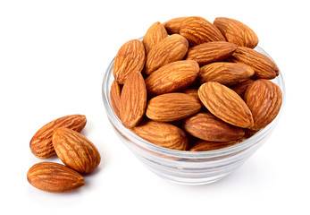 Almonds. Almonds in a bowl isolated on white background. Full depth of field.