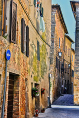 Street of historic center of Pienza in Tuscany, Italy