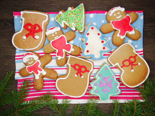 christmas cookies gingerbread and decoration on wooden background