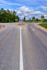 Crossroads on the highway in summer