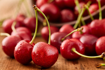Close up of fresh cherry berries with water drops.