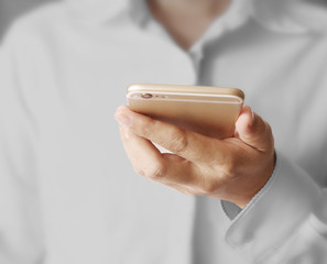 Touch screen smartphone in hand