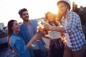 Happy cheerful friends spending fun times together