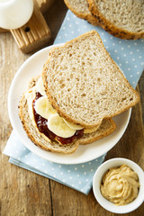 Peanut butter and jelly sandwich with banana