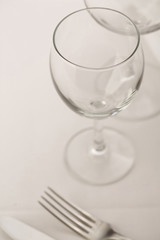Wineglasses arranged in elegant setting, Selective focus with soft light