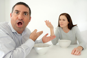 Couple arguing during meal time