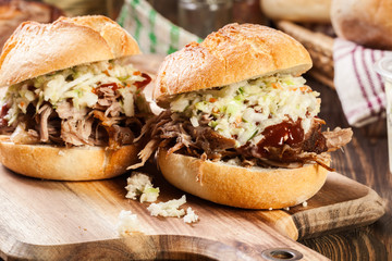 Homemade pulled pork burger with coleslaw salad