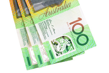 100 Australian dollar (AUD) banknotes on white background