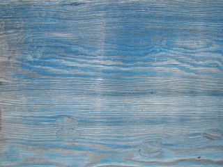 Background old blue paint on a wooden wall