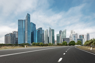 Fototapeta na wymiar empty road with modern buildings