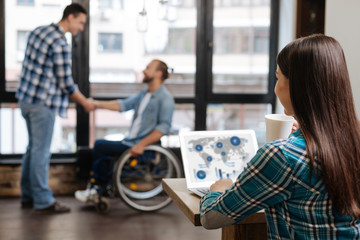 Dedicated smart man inviting an expert in their team