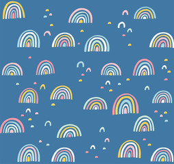 Hand drawn cute abstract pattern. Rainbow doodle vector seamless background. Design for fabric.