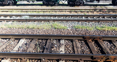 Rails from the train window as a background