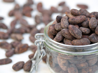 Cocoa beans in a jar, selective focus