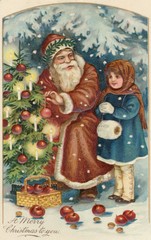 Father Christmas decorating a Xmas tree. Date: circa 1908