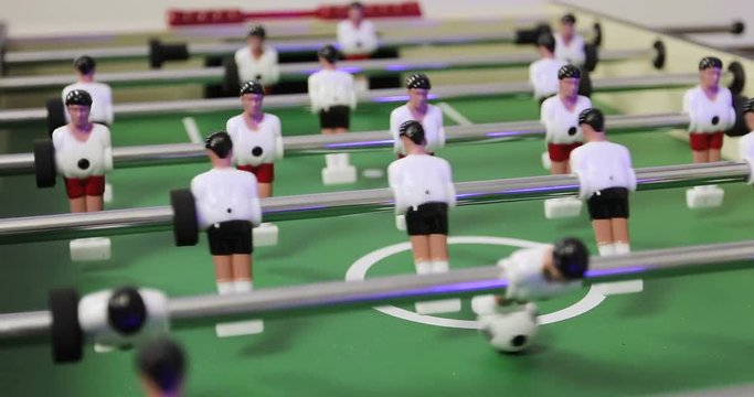 Clouse-up table kicker soccer.