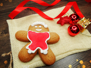 christmas cookies gingerbread and decoration on wooden background