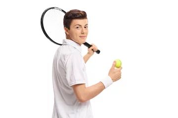 Wandaufkleber Teenage tennis player with a racket and tennis ball © Ljupco Smokovski