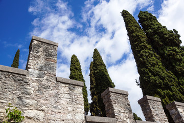 Fototapeta na wymiar Medieval castle in front of a blue sky and cloud