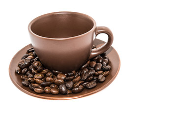Brown Coffee Beans And Coffee Cup