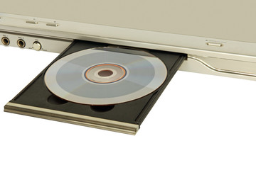DVD player with open disk tray taken closeup on white,