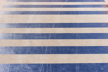 Fototapeta na wymiar Reflective stripes on the asphalt of the airport landing stage