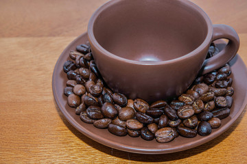 Brown Coffee Beans In Cup