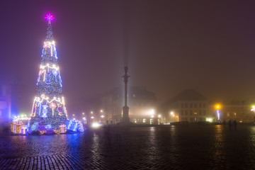Christmas old town in Warsaw in the fog
